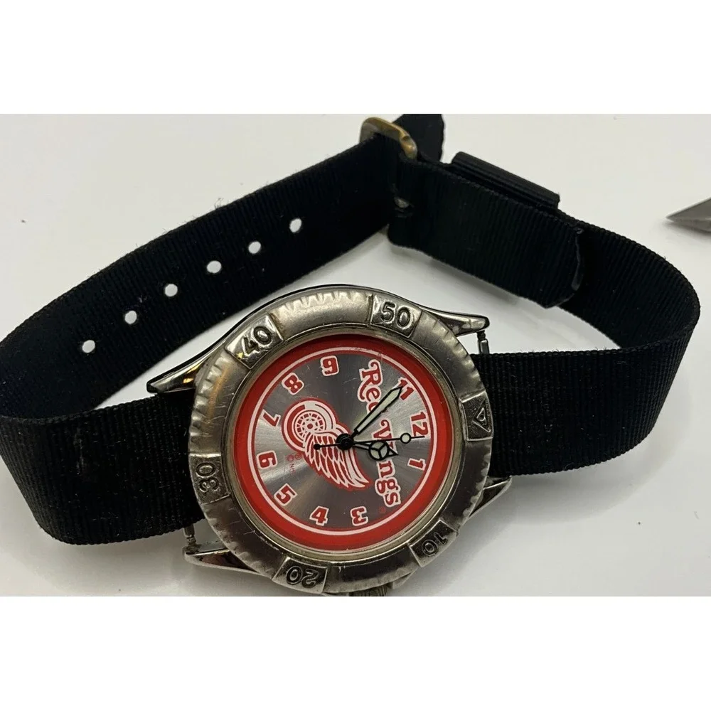 Official NHL Detroit Red wing mens watch, some light wear/age, looks & runs good
